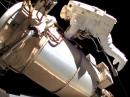 An astronaut works outside the ISS during a March 5 spacewalk. [NASA TV]